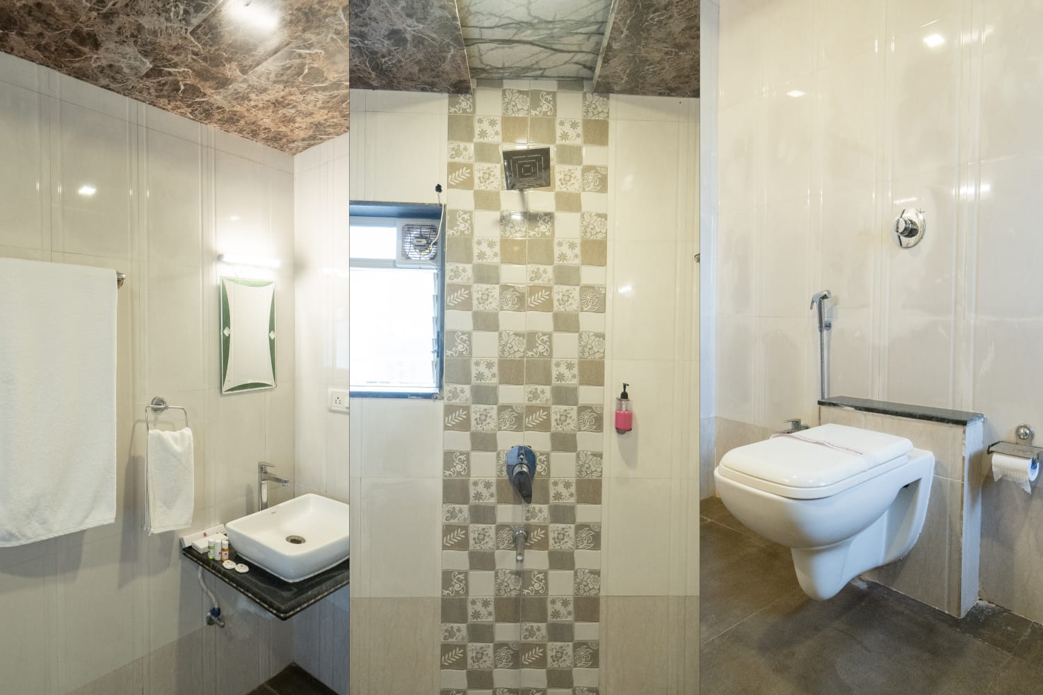 The Tranquil Terrace room bathroom with a white basin, a mirror and a wall-hung toilet